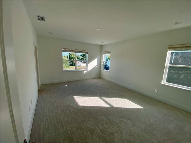 58 Overleaf Ln, Orlando, FL 32839 - spare room featuring carpet floors and baseboards