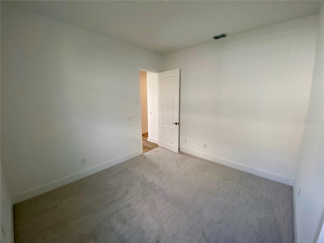 empty room featuring carpet flooring