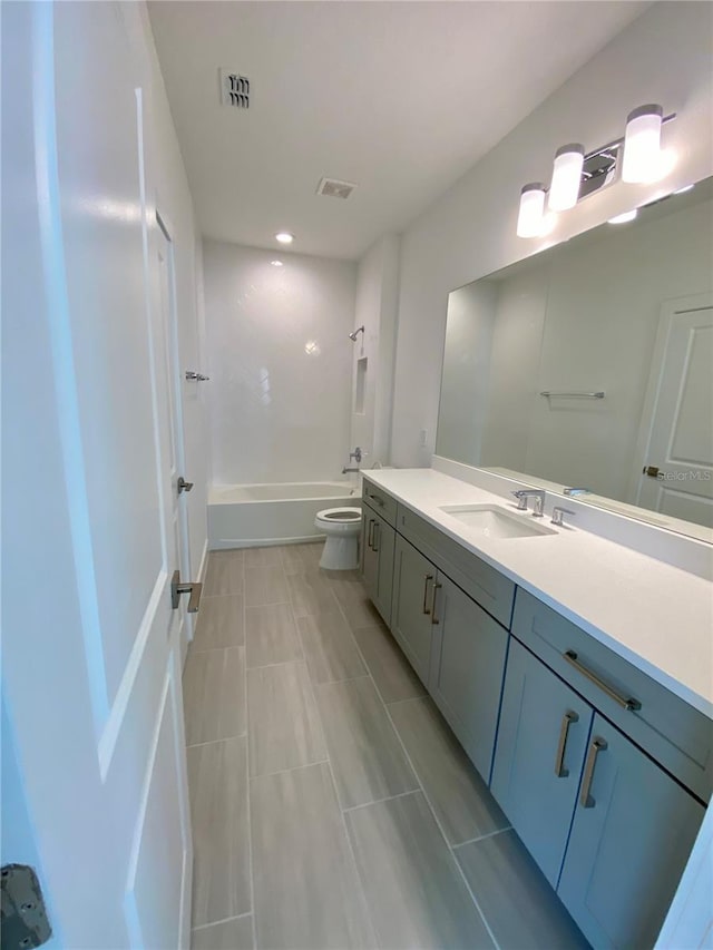 full bathroom with vanity, toilet, bathtub / shower combination, and tile patterned flooring