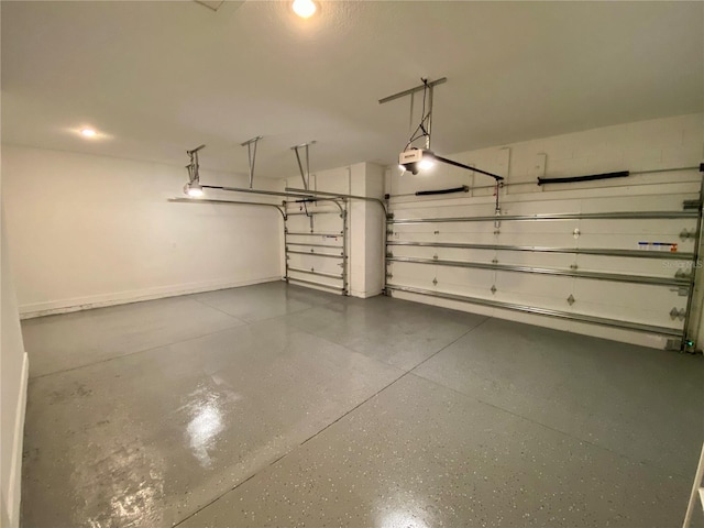 58 Overleaf Ln, Orlando, FL 32839 - garage with a garage door opener and recessed lighting