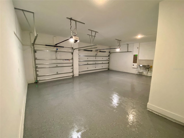 58 Overleaf Ln, Orlando, FL 32839 - garage featuring a garage door opener and electric panel