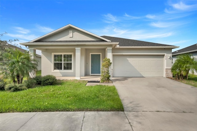 single story home with a front yard, a garage, and covered porch