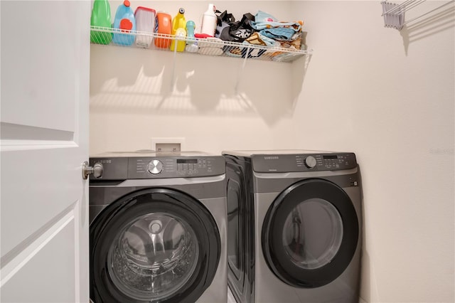 laundry area with washer and dryer