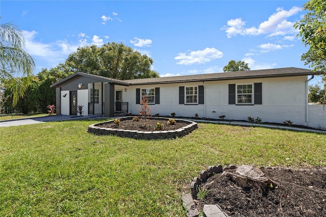 single story home featuring a front yard