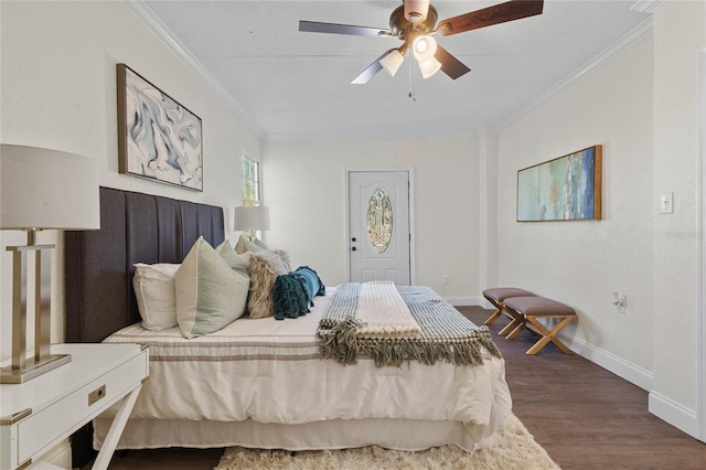 bedroom with ceiling fan, ornamental molding, and dark hardwood / wood-style flooring