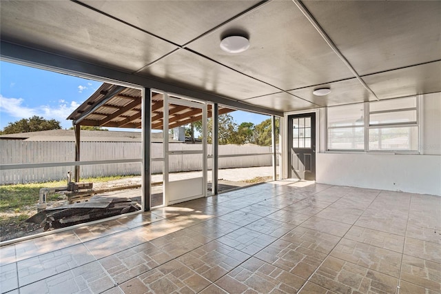 view of unfurnished sunroom