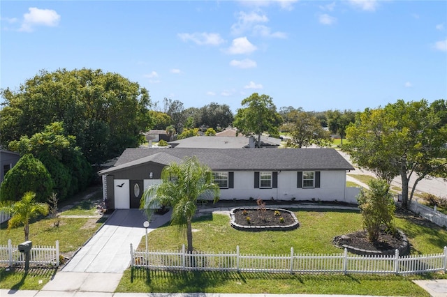 ranch-style home featuring a front yard