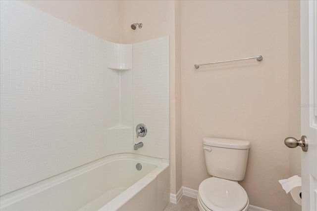 bathroom with toilet, tile patterned floors, and shower / tub combination