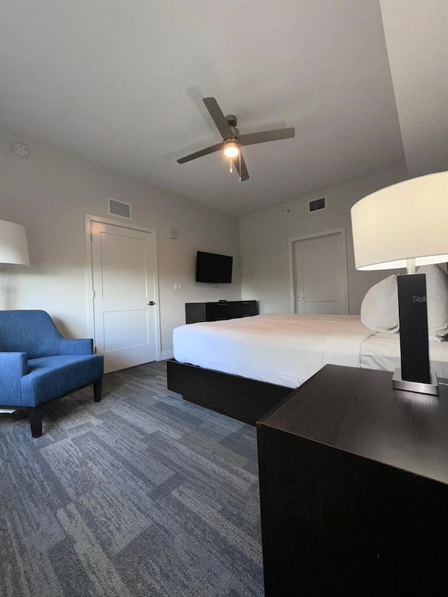 carpeted bedroom featuring ceiling fan