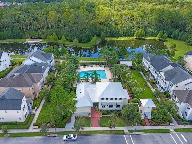 birds eye view of property featuring a water view