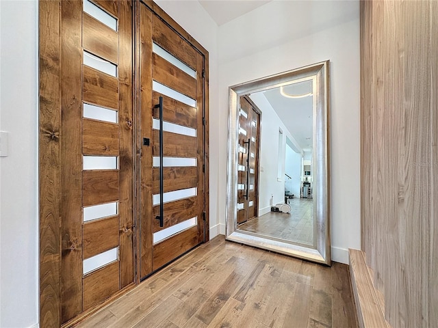 entryway with light hardwood / wood-style floors