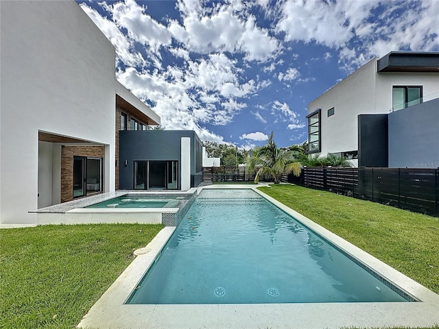 view of pool featuring a yard