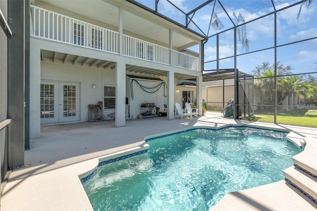 view of pool featuring a patio and a lanai