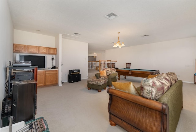 living room with pool table, light colored carpet, and an inviting chandelier