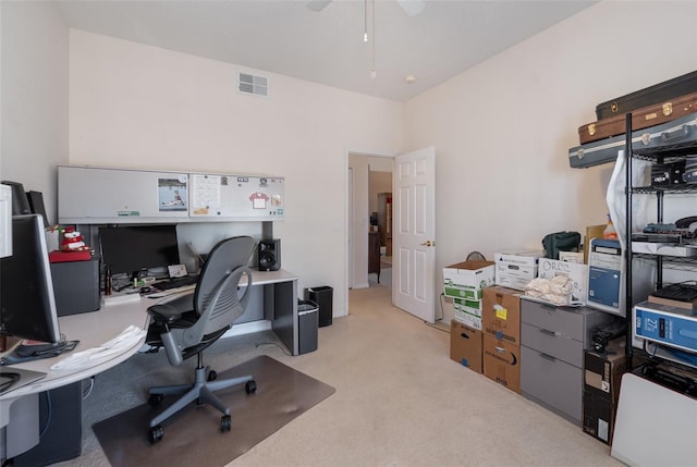 office area with light carpet and ceiling fan