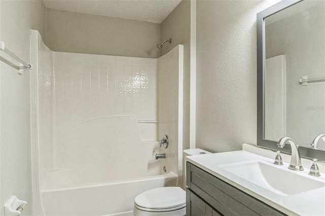 full bathroom with vanity, toilet, and washtub / shower combination