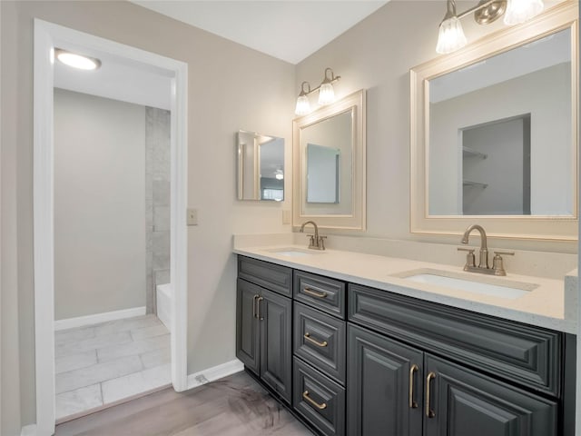 bathroom featuring vanity and hardwood / wood-style floors