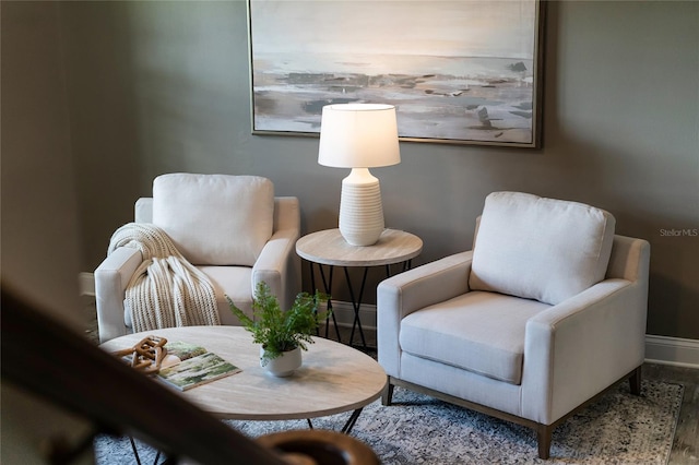 sitting room with hardwood / wood-style floors