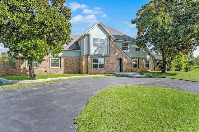 view of front of home with a front lawn