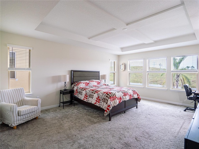 bedroom with carpet flooring and a textured ceiling