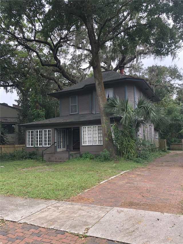 522 S Osceola Ave, Orlando, FL 32801 - traditional-style house featuring a front yard and french doors