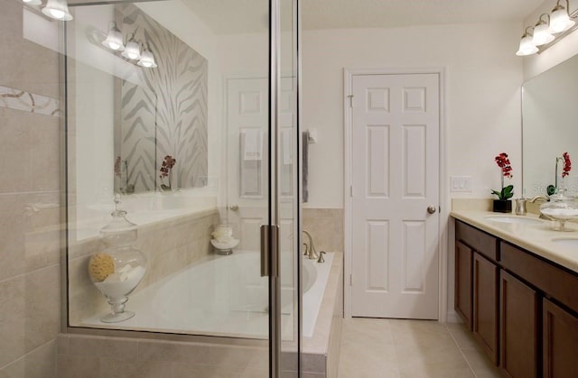 bathroom with vanity, separate shower and tub, and tile patterned flooring