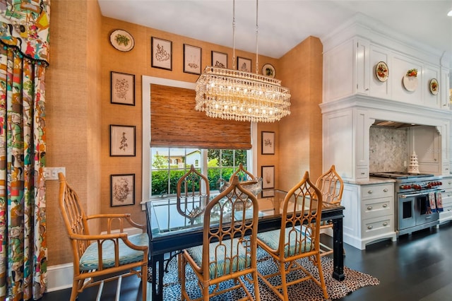 dining area featuring a notable chandelier