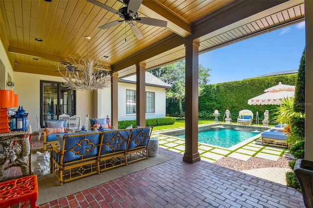 view of pool featuring a patio area, an outdoor hangout area, and ceiling fan