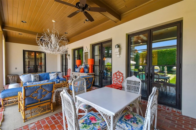 view of patio featuring french doors and ceiling fan