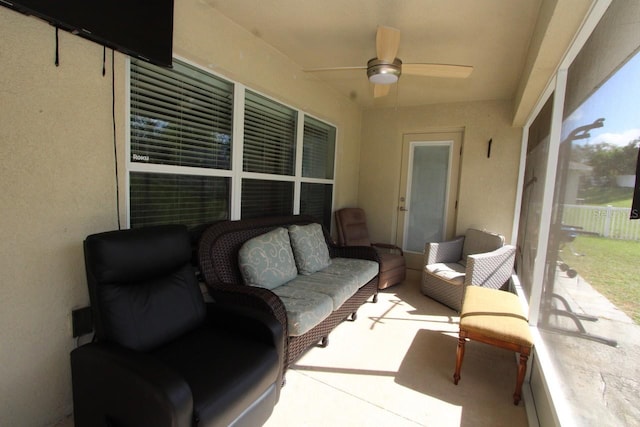 sunroom / solarium with ceiling fan