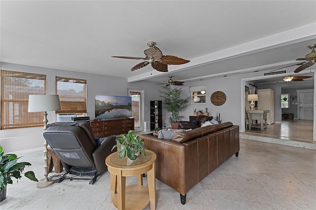 living room with ceiling fan