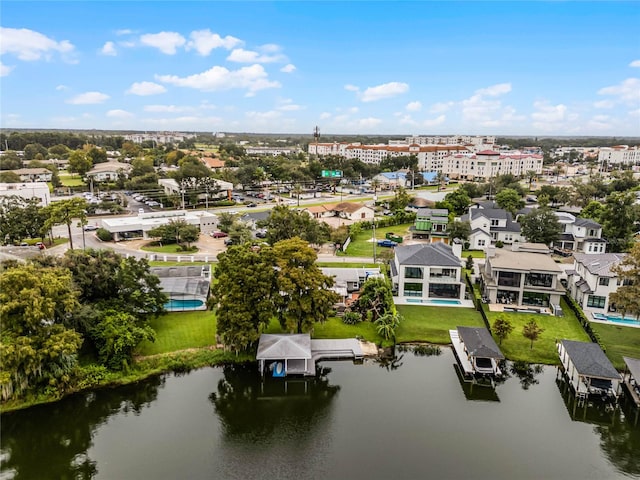 drone / aerial view with a water view