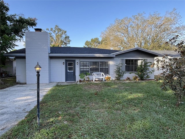 ranch-style house with a front yard