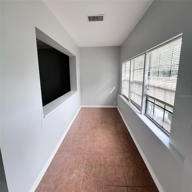 view of tiled spare room