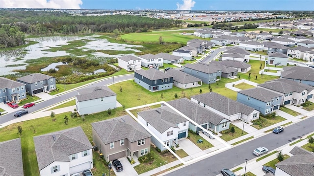 drone / aerial view with a water view