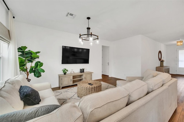 living room featuring plenty of natural light and light wood-type flooring