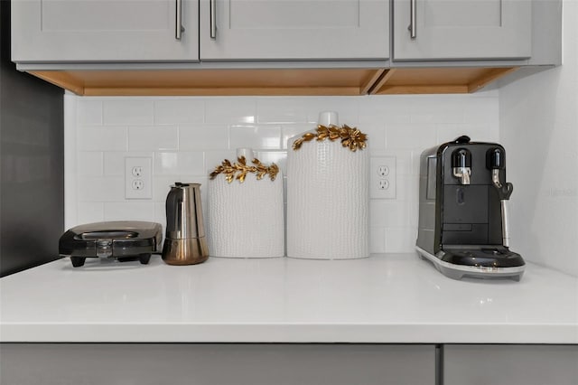 interior details featuring backsplash