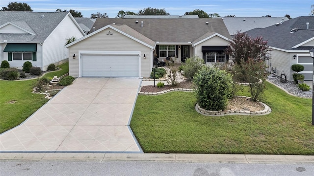 ranch-style house featuring a front yard and a garage