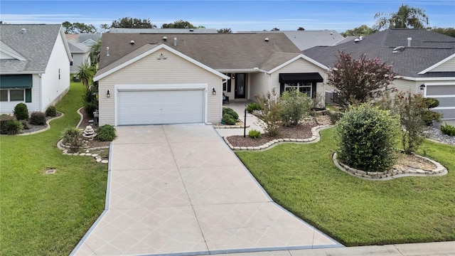 ranch-style house featuring a garage and a front lawn