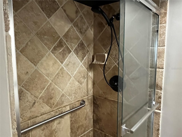 bathroom featuring an enclosed shower