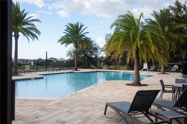 view of pool featuring a patio area