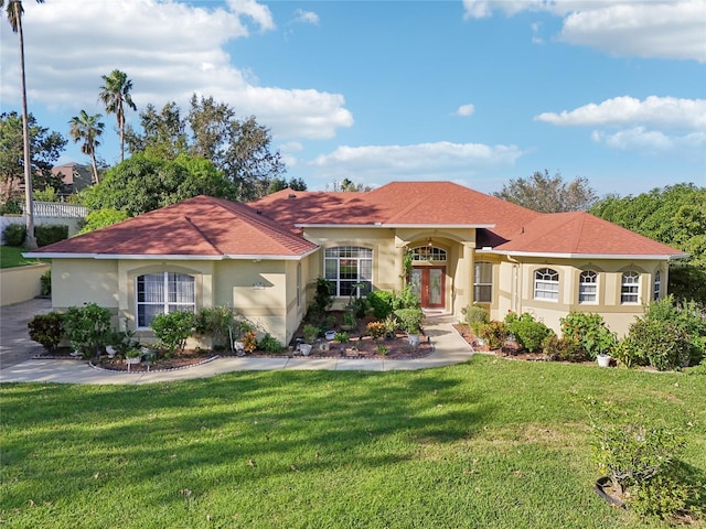 view of front of home with a front yard