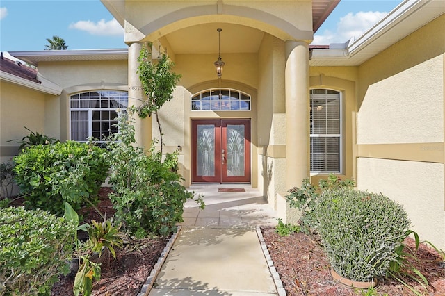 doorway to property featuring french doors