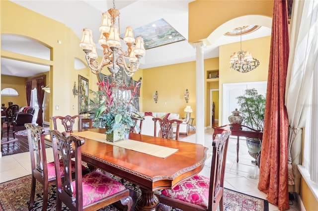 tiled dining space featuring ornate columns