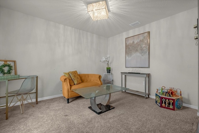 living area featuring carpet floors