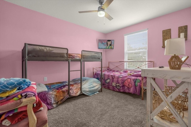 bedroom featuring ceiling fan and carpet