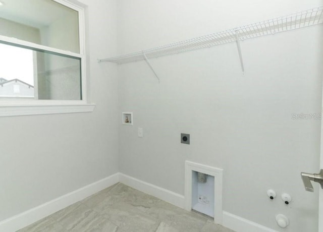 laundry room featuring hookup for an electric dryer, gas dryer hookup, and washer hookup