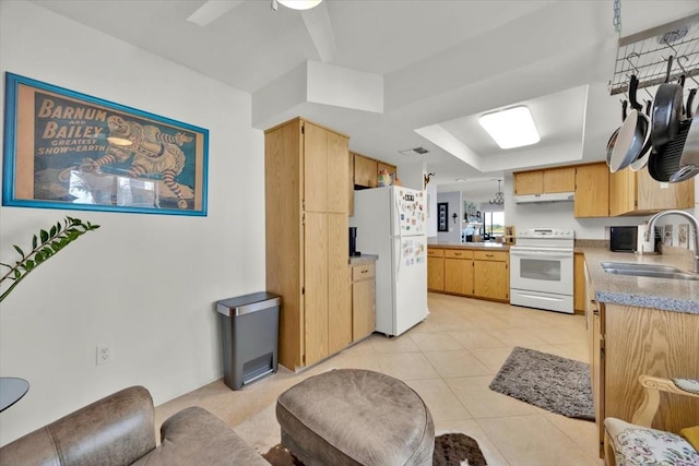 kitchen with white appliances, sink, light tile patterned floors, and ceiling fan