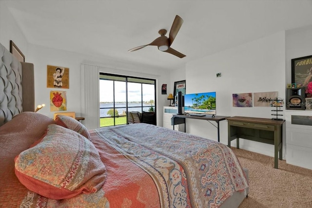 bedroom featuring carpet floors, ceiling fan, and access to exterior