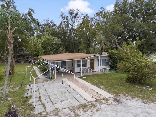 exterior space featuring a front lawn